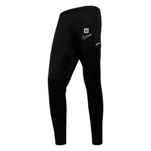 Le pantalon de jogging Academy est un pantalon de sport noir doté d'un logo Nike blanc sur la cuisse gauche et d'une ceinture élastique. Ce pantalon long a une coupe slim.