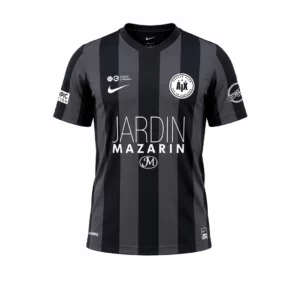 Le Maillot Domicile 2025/2026 est un maillot de sport noir à rayure grise, comportant le logo du sponsor « Jardin Mazarin » et l'insigne circulaire blanc AIX sur la poitrine. Le logo Nike est affiché sur le côté droit et « LA GRINTA » est imprimé près du bas.